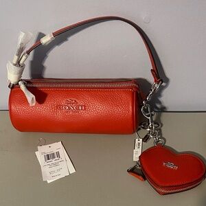 Coach Nolita barrel bag with Heart coin